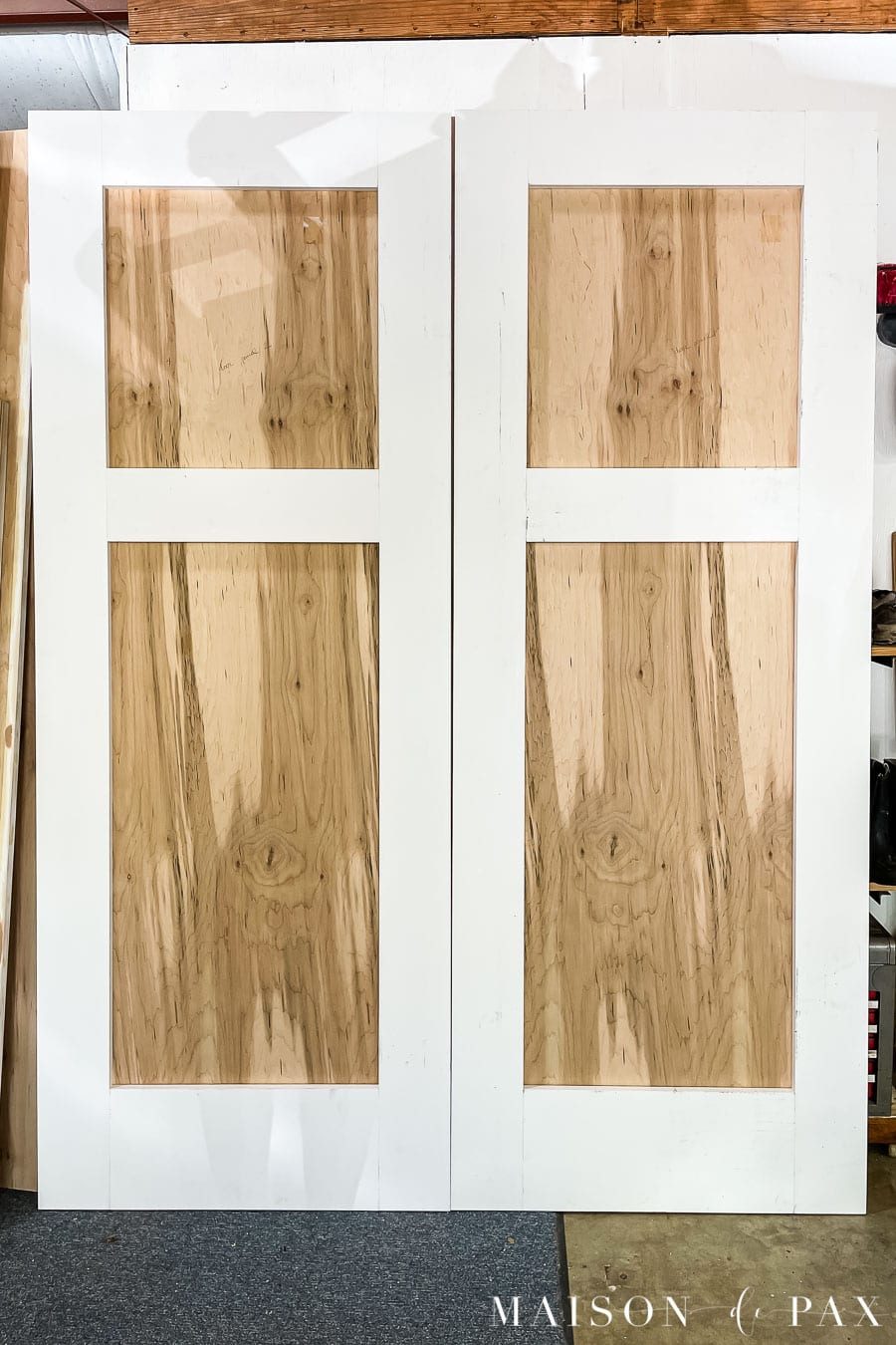 attach decorative trim to plywood for door panels