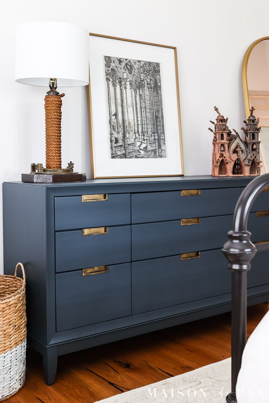 dark blue painted dresser with gold hardware