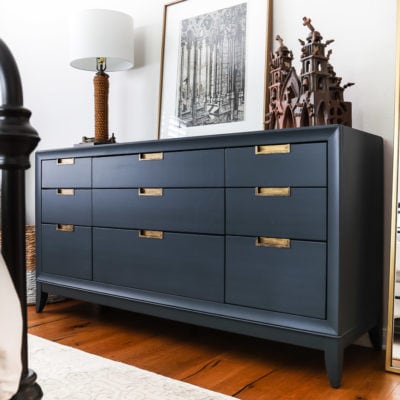 dark blue dresser with brass inset hardware, how to paint a dresser