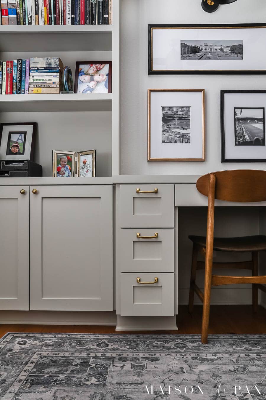 SW Agreeable Gray cabinets and built in desk with unlacquered brass knobs and pulls