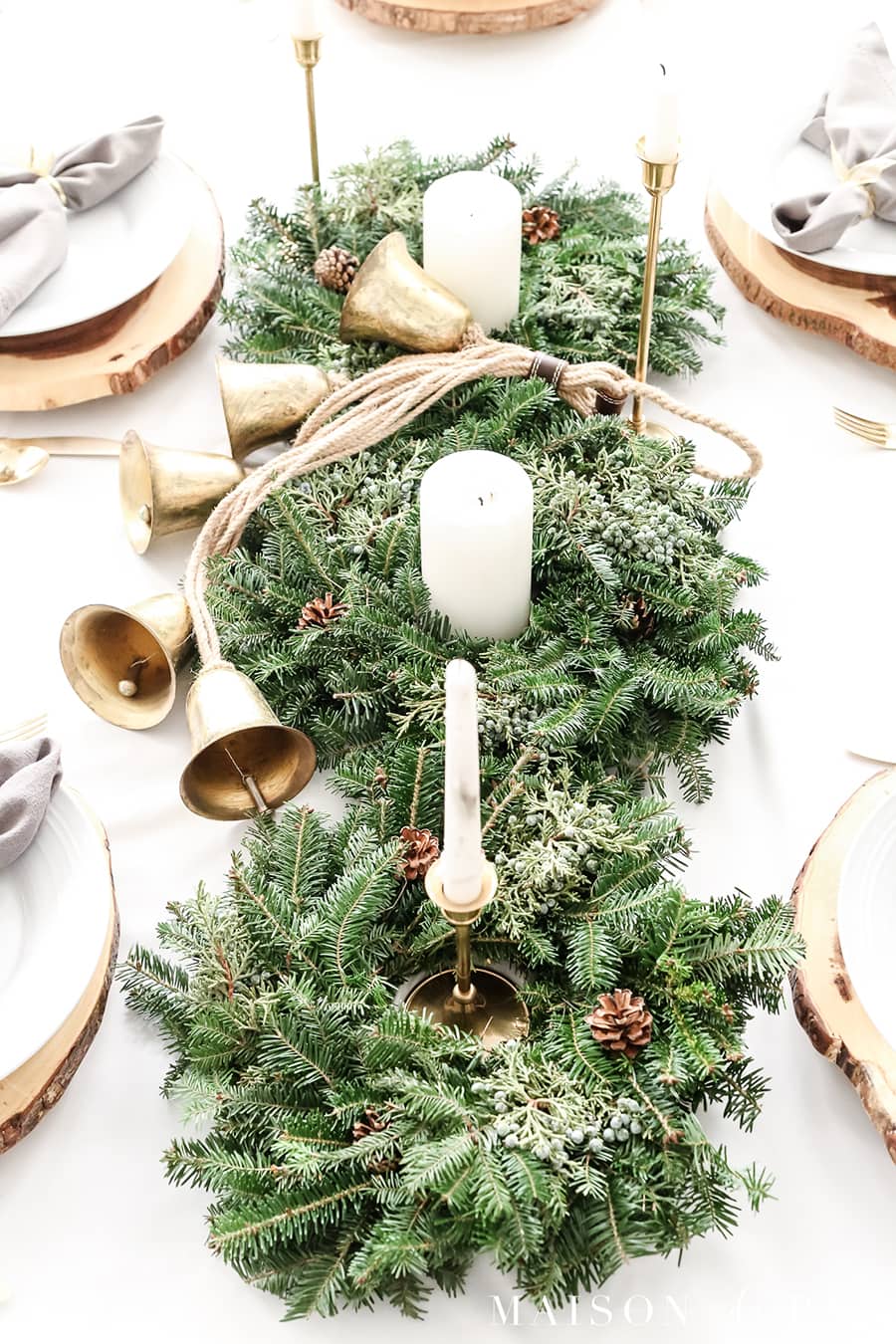 gold bells and mini wreaths as Christmas centerpiece