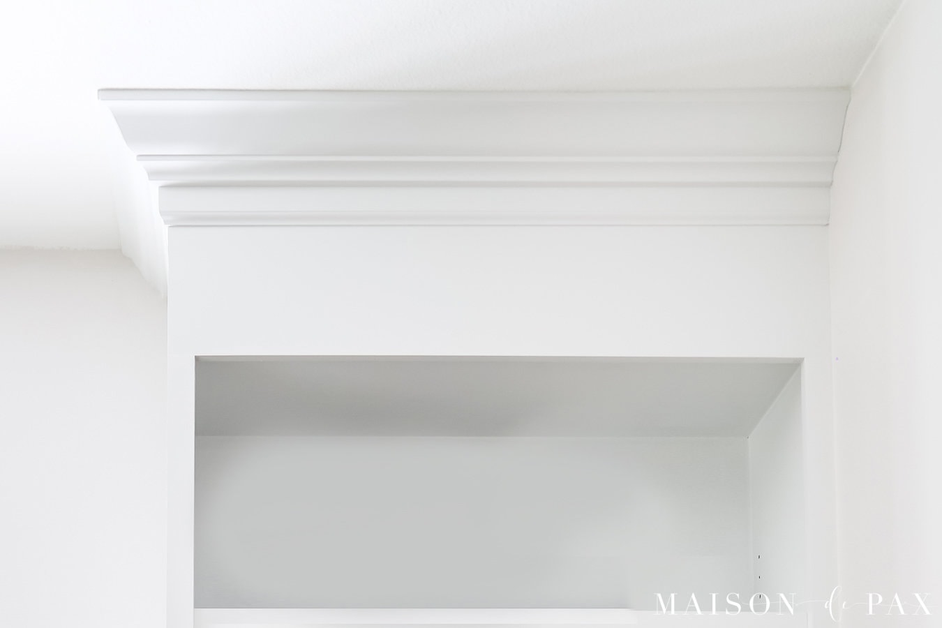 stacked crown molding on bookcase