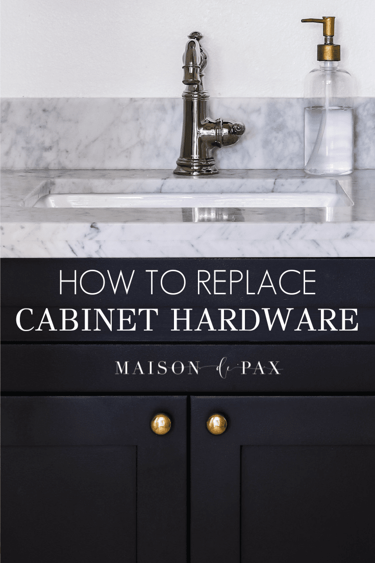bathroom cabinet with beautiful hardware and text overlay that reads how to replace cabinet hardware