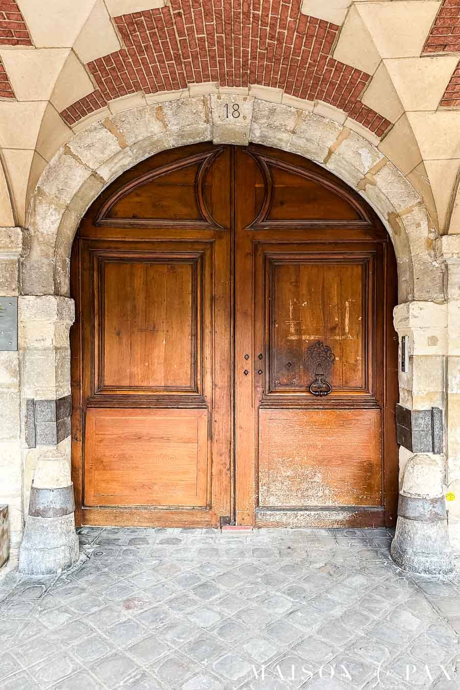 arched double doors parisian entryway doorway