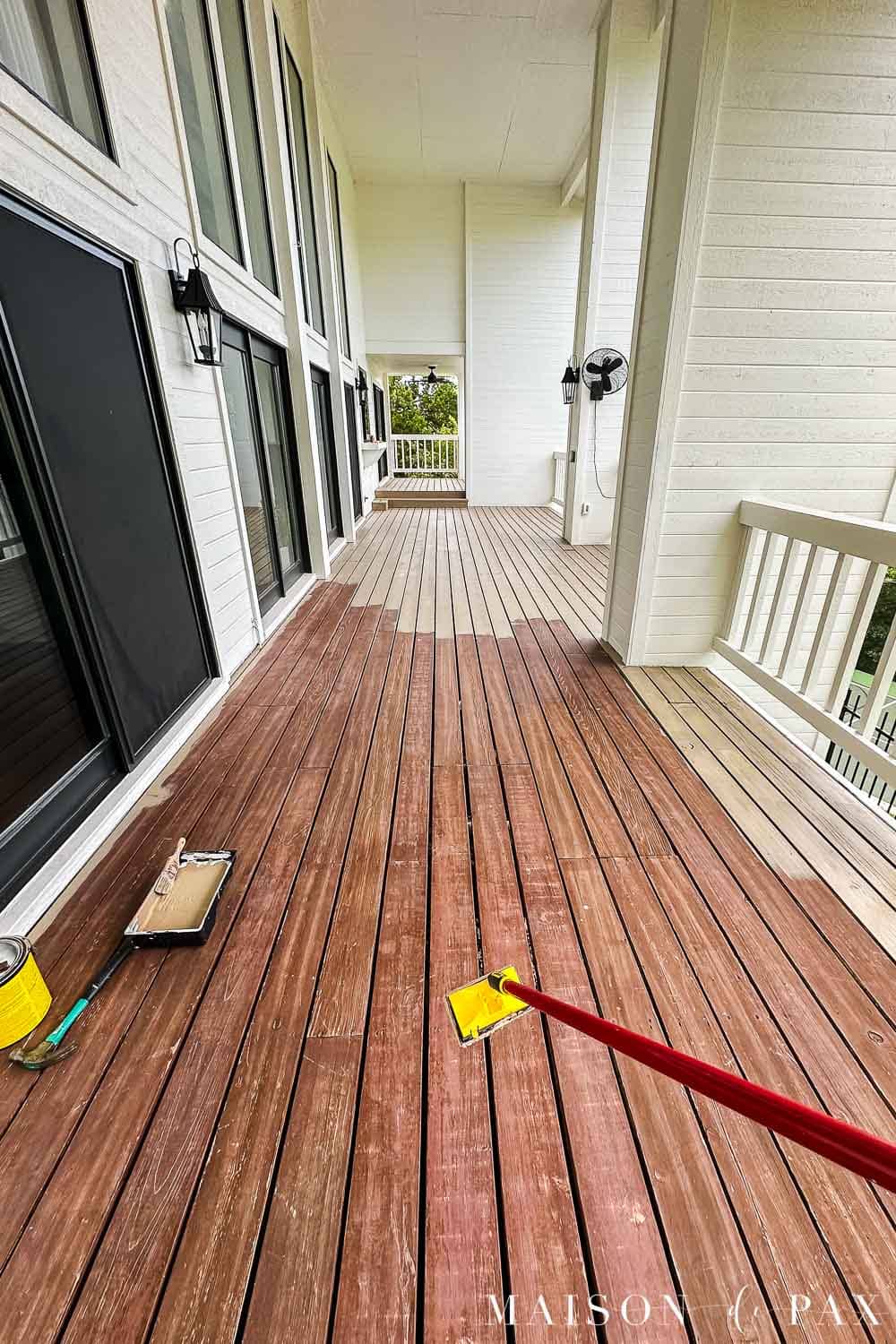 Solid deck stain in Cabot Acorn being applied with a stain pad beside the old reddish-brown finish, showing the dramatic color change.
